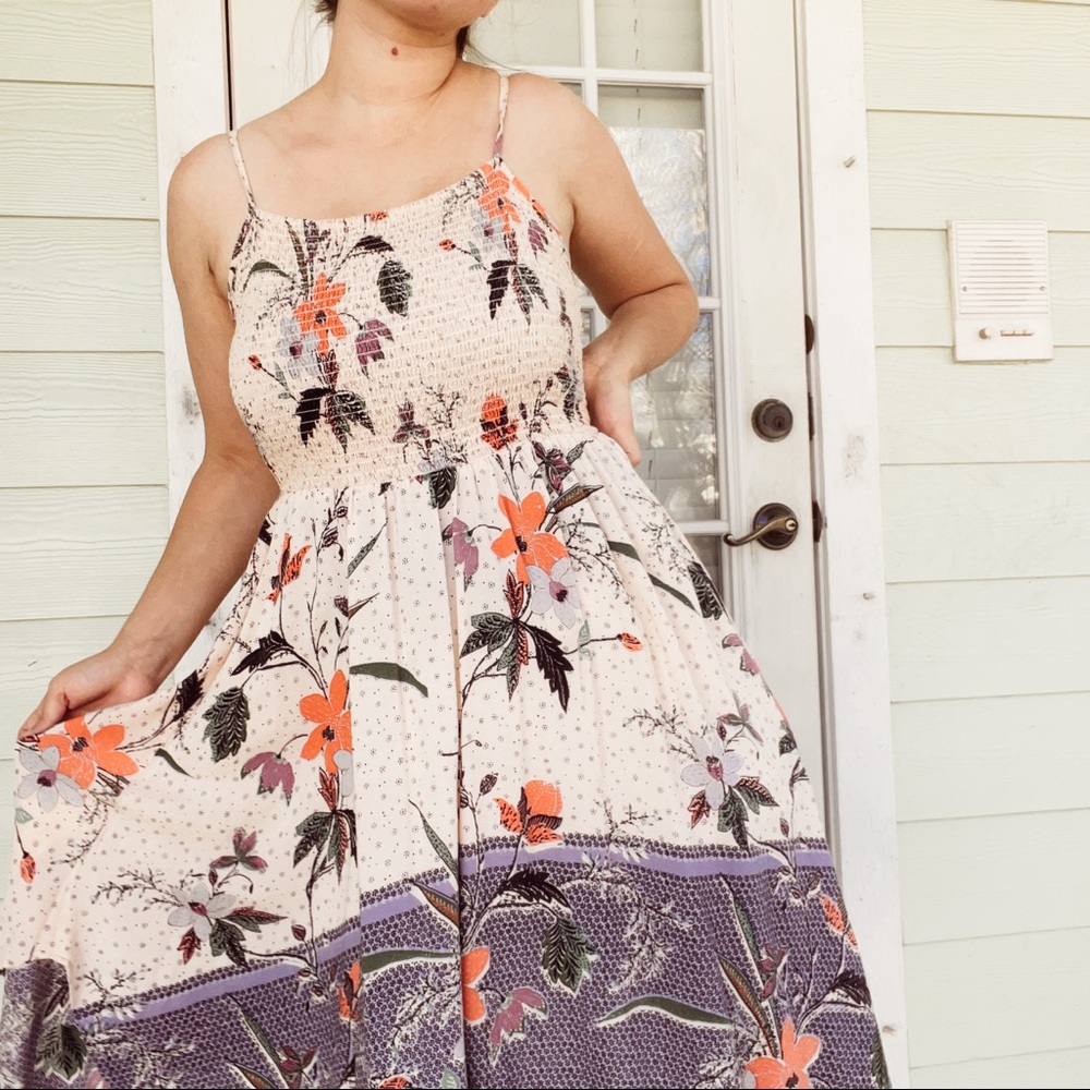 Spaghetti strap sun dress with floral design for spring or summer